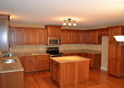 New home showing large kitchen with cabinets and appliances.