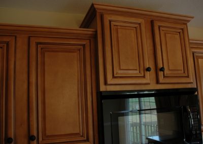 Maple stained wood cabinets