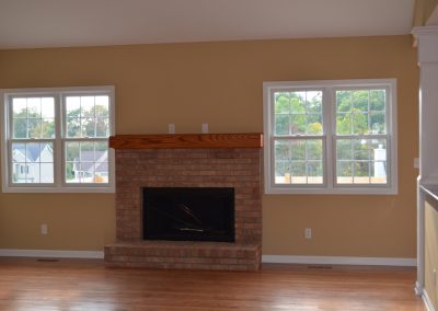 Family room and fireplace of an available home