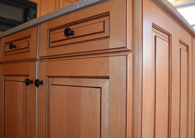 Cabinets with glazed maple color stain