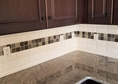 Tile backsplash in kitchen
